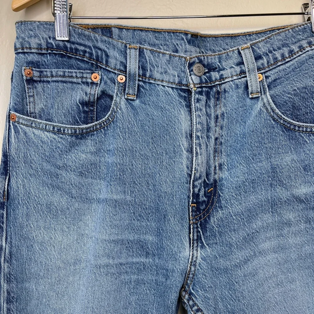 Levi’s 512 Perfect Medium Wash Factory Distressed High Rise Slim Tapered Jeans